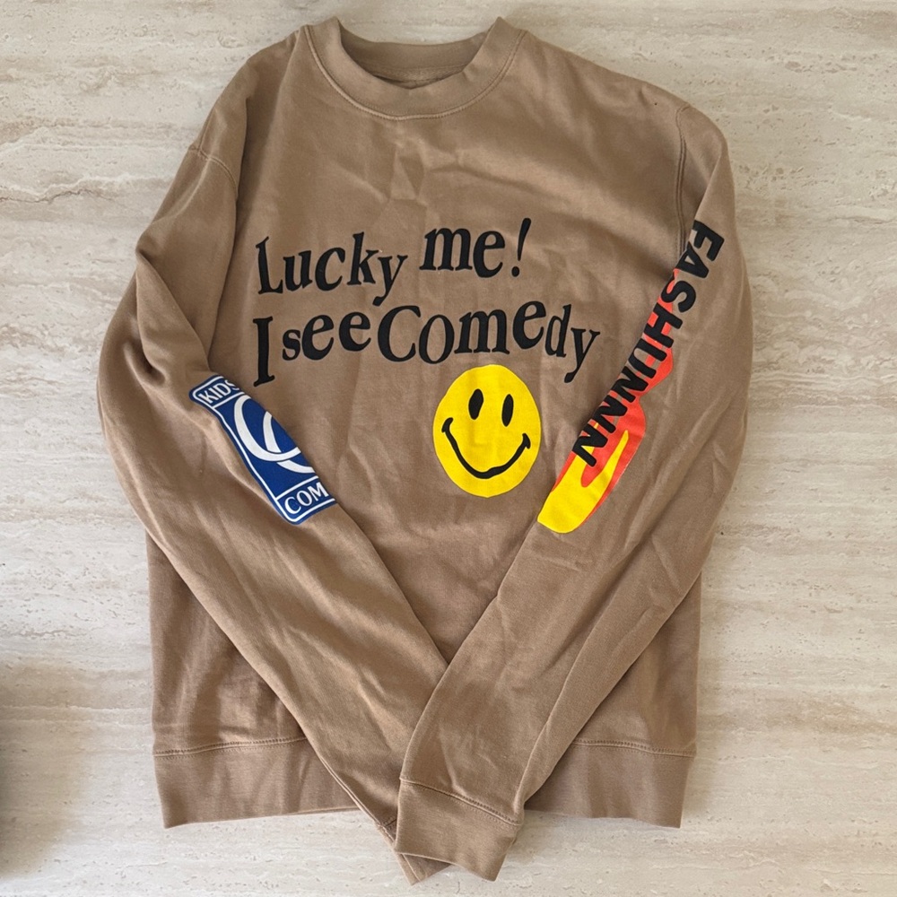 ‘Fashun’ by Andrew Schultz Tan Graphic Crewneck Sweater